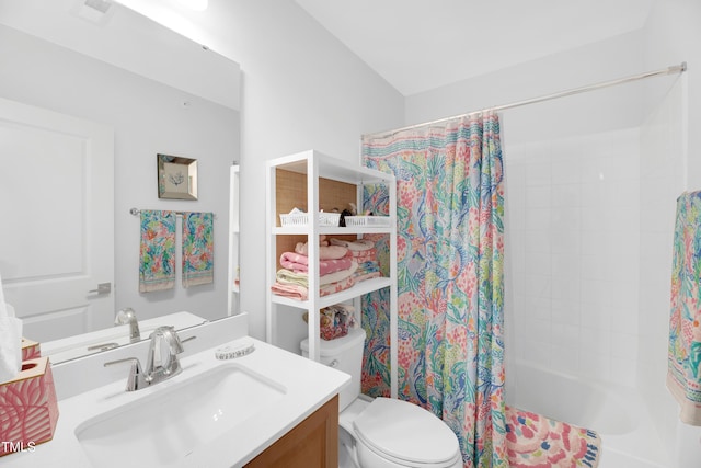 bathroom featuring toilet, shower / bathtub combination with curtain, and vanity