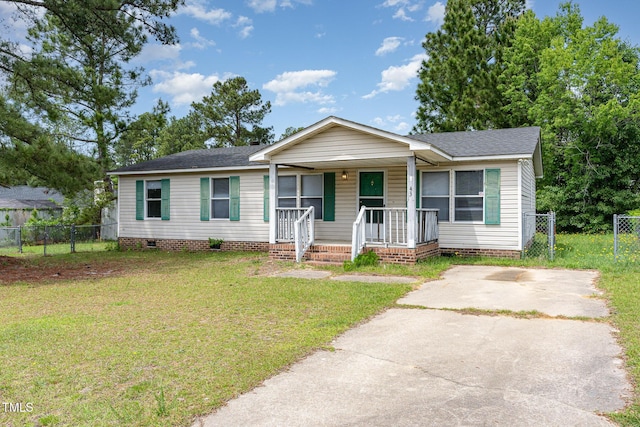 view of front facade with a porch, a front lawn, fence, and crawl space