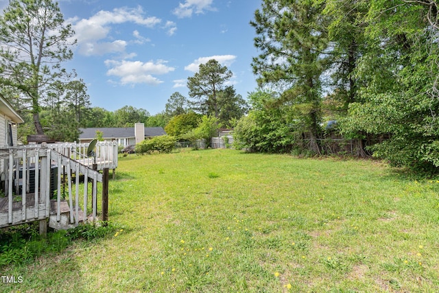 view of yard featuring a deck