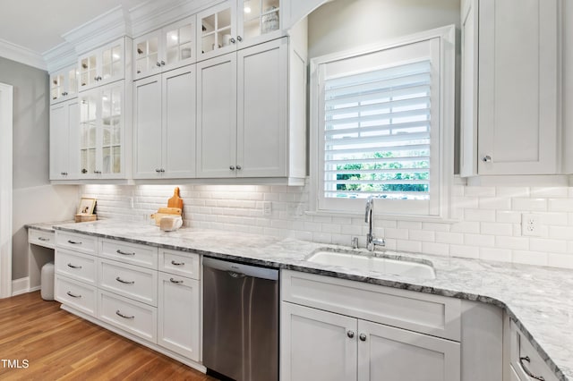 6 Castlewood Dr, Durham, NC 27713 - kitchen featuring dishwasher, a sink, crown molding, white cabinets, and light wood finished floors