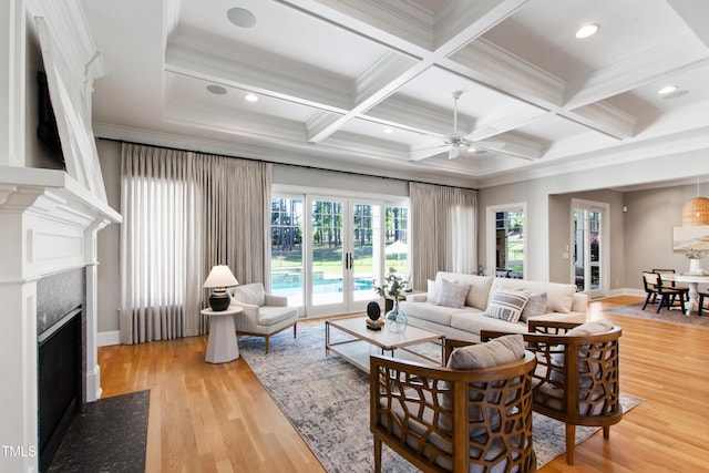 6 Castlewood Dr, Durham, NC 27713 - living area featuring ceiling fan, coffered ceiling, crown molding, a premium fireplace, and beamed ceiling