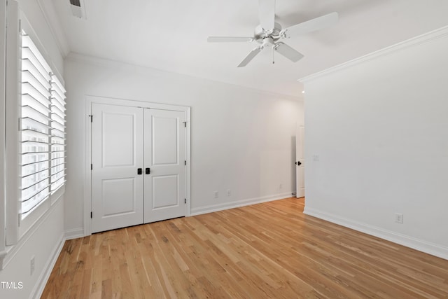 6 Castlewood Dr, Durham, NC 27713 - unfurnished room with ornamental molding, a ceiling fan, light wood-type flooring, plenty of natural light, and baseboards