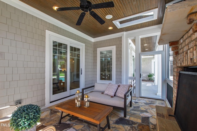 6 Castlewood Dr, Durham, NC 27713 - sunroom featuring a skylight, a ceiling fan, and an outdoor living space