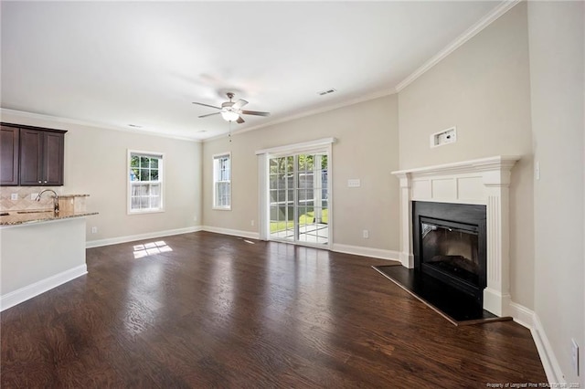 915 Carolina Ave, Fayetteville, NC 28301 - unfurnished living room with plenty of natural light, ceiling fan, and dark wood-type flooring