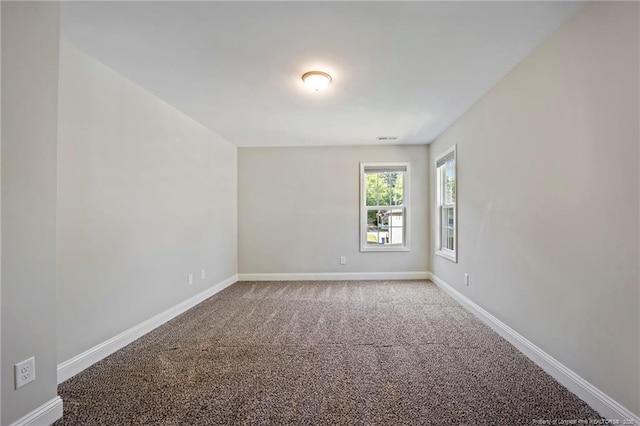 915 Carolina Ave, Fayetteville, NC 28301 - empty room with carpet floors and baseboards