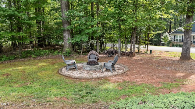 109 Rustler Rd, Louisburg, NC 27549 - view of grassy yard featuring a fire pit
