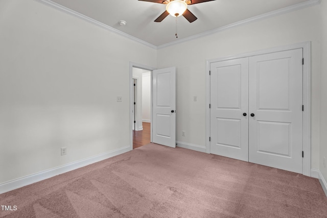 109 Rustler Rd, Louisburg, NC 27549 - unfurnished bedroom featuring carpet floors, crown molding, a closet, and a ceiling fan