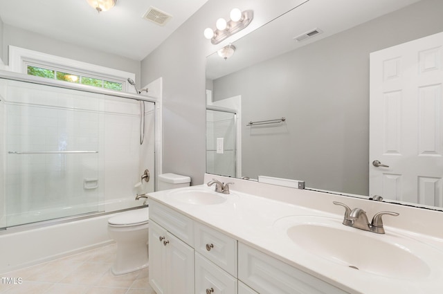 full bathroom with visible vents, a sink, and toilet