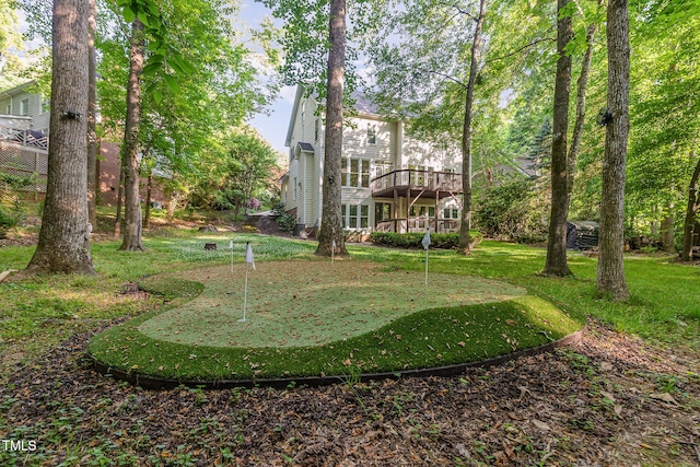 view of yard featuring a wooden deck
