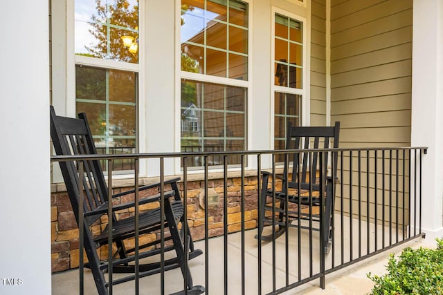 balcony featuring a porch