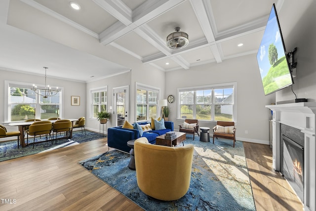 110 Deacon Ridge Ln, Youngsville, NC 27596 - living room featuring beamed ceiling, light wood-type flooring, and a wealth of natural light