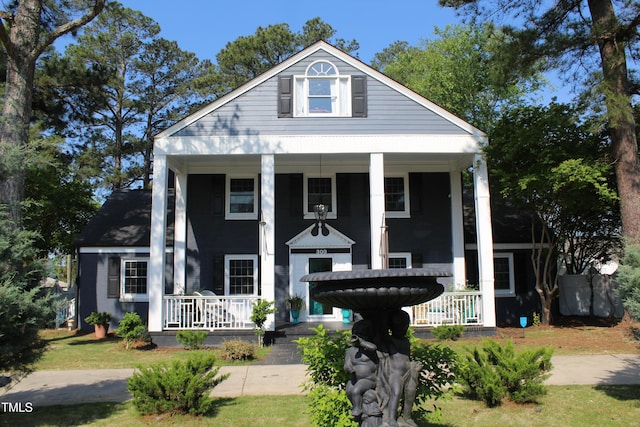 neoclassical / greek revival house with a porch