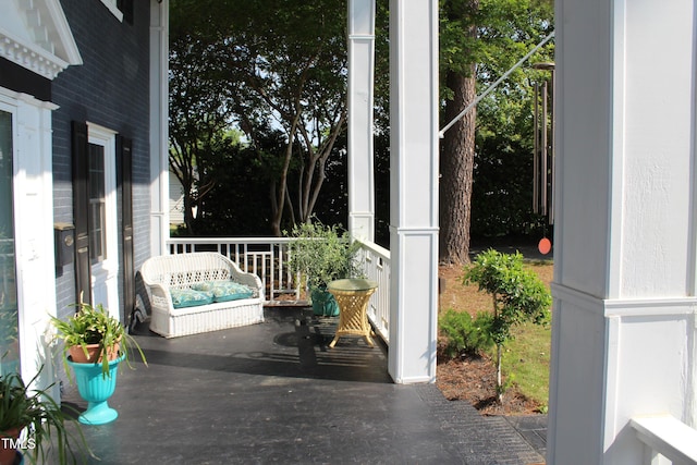 view of patio featuring a porch