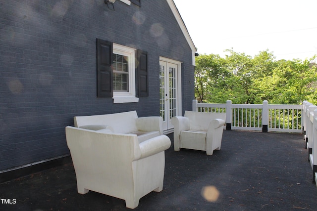 view of patio / terrace featuring french doors and an outdoor hangout area