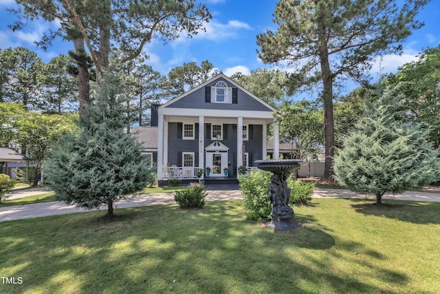 300 S Pine St, Benson, NC 27504 - greek revival inspired property featuring covered porch and a front lawn