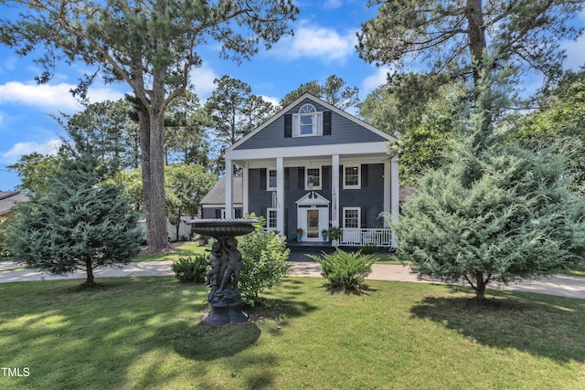 300 S Pine St, Benson, NC 27504 - greek revival inspired property featuring covered porch and a front lawn