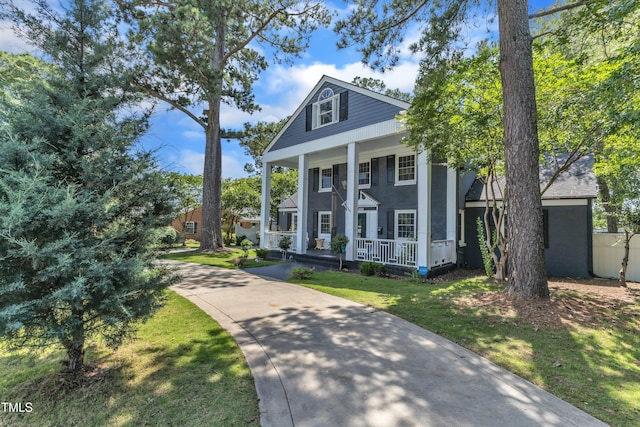 300 S Pine St, Benson, NC 27504 - greek revival house with a porch and a front lawn