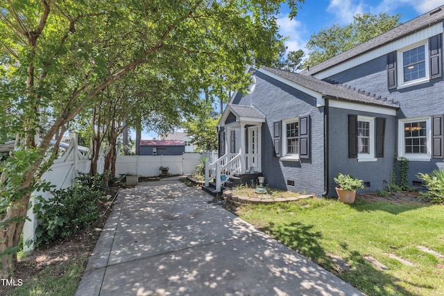 300 S Pine St, Benson, NC 27504 - view of front of home featuring brick siding and crawl space