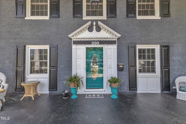 300 S Pine St, Benson, NC 27504 - doorway to property with brick siding