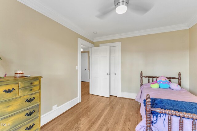 300 S Pine St, Benson, NC 27504 - bedroom featuring crown molding, wood finished floors, and ceiling fan