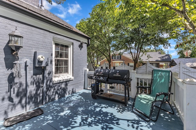 300 S Pine St, Benson, NC 27504 - wooden deck with a grill