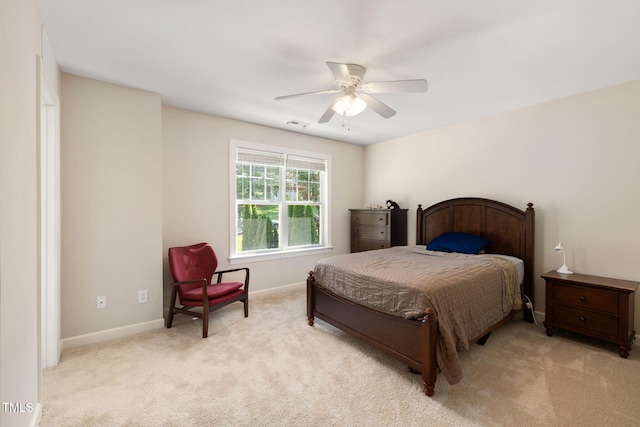bedroom featuring carpet floors, baseboards, a ceiling fan, and visible vents