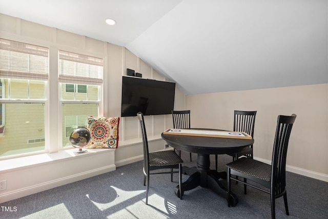 dining space with visible vents, vaulted ceiling, baseboards, dark colored carpet, and recessed lighting