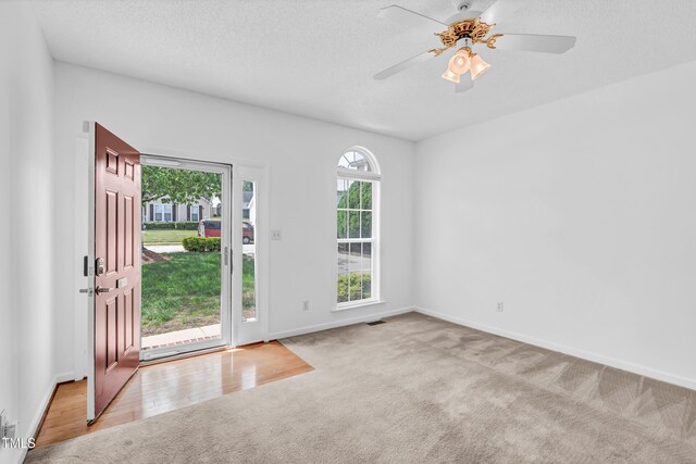 7109 Spanglers Spring Way, Raleigh, NC 27610 - interior space with ceiling fan, a textured ceiling, visible vents, carpet floors, and baseboards