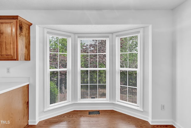 7109 Spanglers Spring Way, Raleigh, NC 27610 - interior space featuring baseboards, wood finished floors, and visible vents