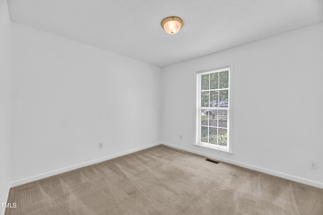 7109 Spanglers Spring Way, Raleigh, NC 27610 - carpeted spare room featuring baseboards and visible vents