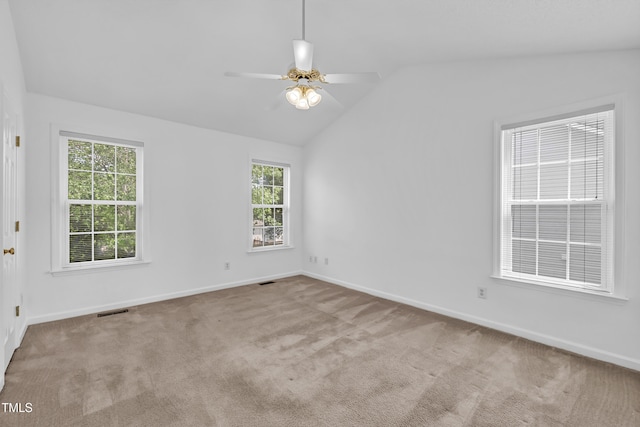 7109 Spanglers Spring Way, Raleigh, NC 27610 - carpeted empty room featuring baseboards, a wealth of natural light, vaulted ceiling, and visible vents