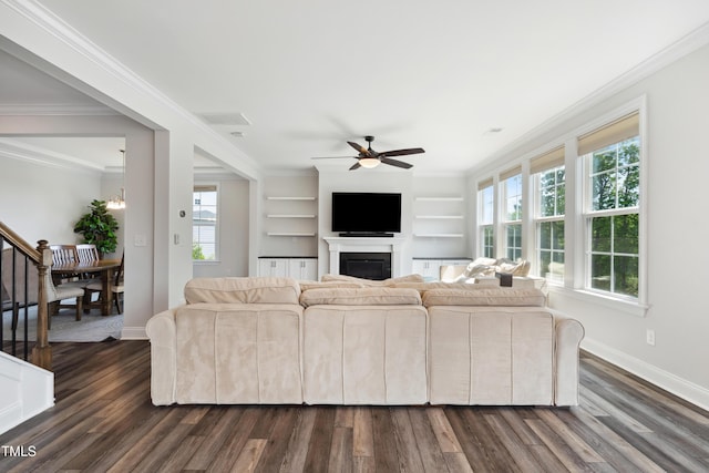 46 Waterfall Pointe, Chapel Hill, NC 27517 - living room featuring baseboards, a ceiling fan, dark wood finished floors, and a glass covered fireplace