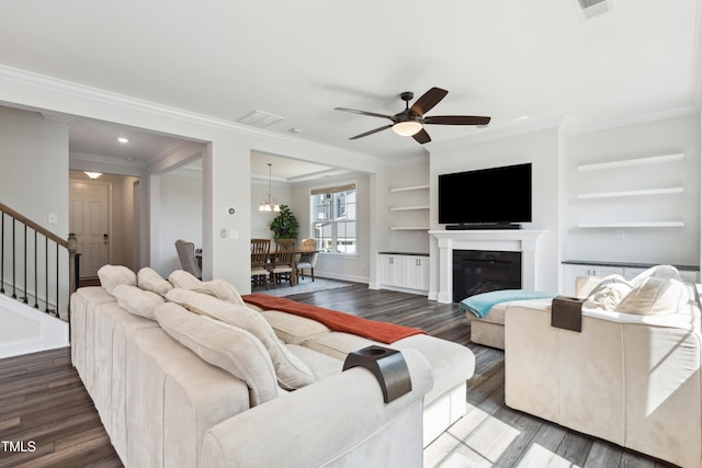 46 Waterfall Pointe, Chapel Hill, NC 27517 - living room featuring crown molding, built in features, ceiling fan, and wood finished floors