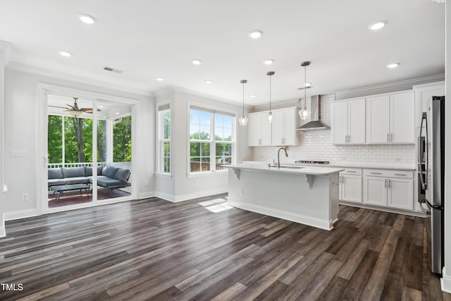 46 Waterfall Pointe, Chapel Hill, NC 27517 - kitchen with freestanding refrigerator, baseboards, wall chimney exhaust hood, and light countertops