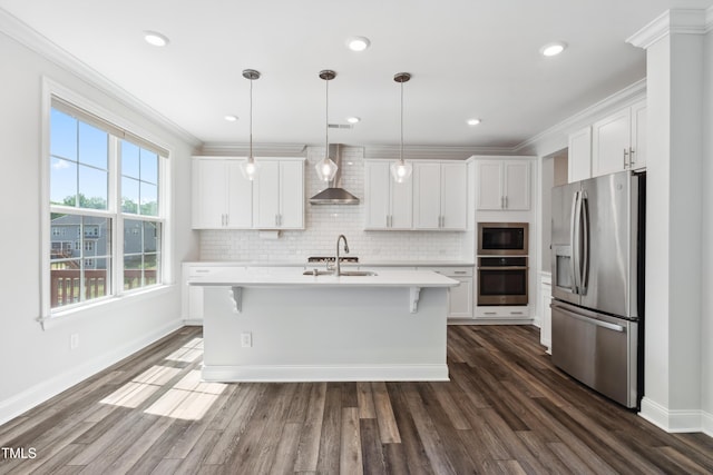46 Waterfall Pointe, Chapel Hill, NC 27517 - kitchen with light countertops, white cabinetry, appliances with stainless steel finishes, and wall chimney range hood