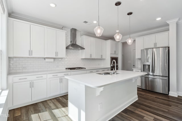 46 Waterfall Pointe, Chapel Hill, NC 27517 - kitchen with wall chimney exhaust hood, white cabinets, a sink, appliances with stainless steel finishes, and backsplash