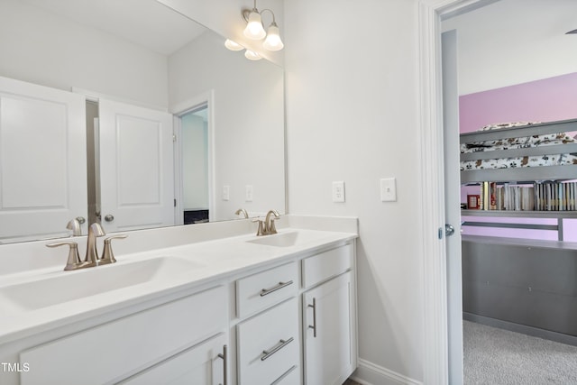 46 Waterfall Pointe, Chapel Hill, NC 27517 - bathroom with double vanity, baseboards, and a sink