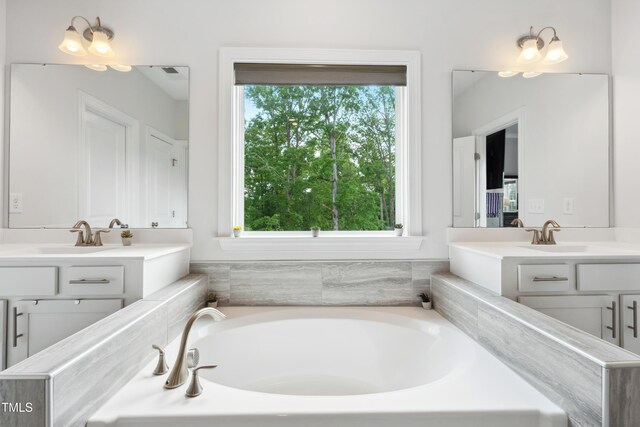 46 Waterfall Pointe, Chapel Hill, NC 27517 - bathroom with plenty of natural light, a sink, and two vanities