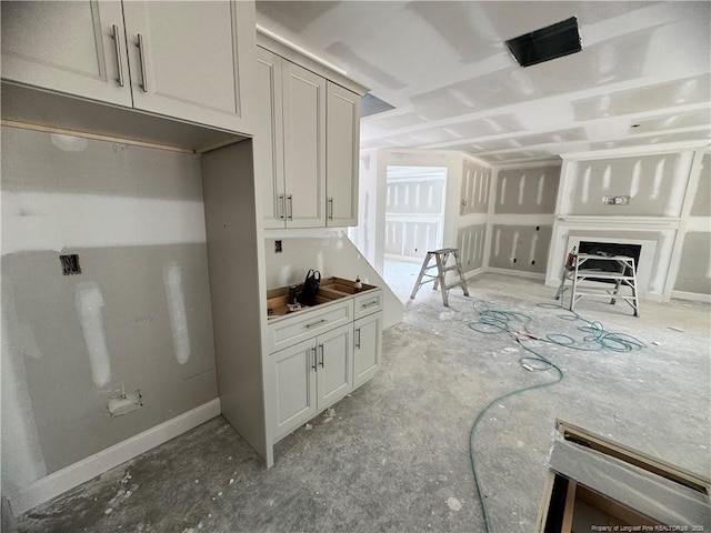 303 Hendrix B Rd, Raeford, NC 28376 - kitchen featuring a fireplace