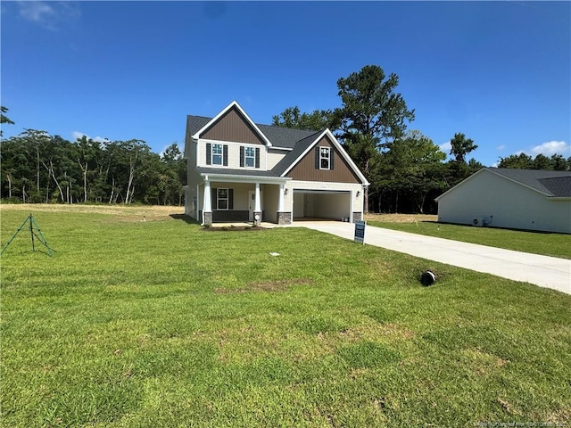 303 Hendrix B Rd, Raeford, NC 28376 - craftsman inspired home with driveway, a porch, a garage, and a front yard