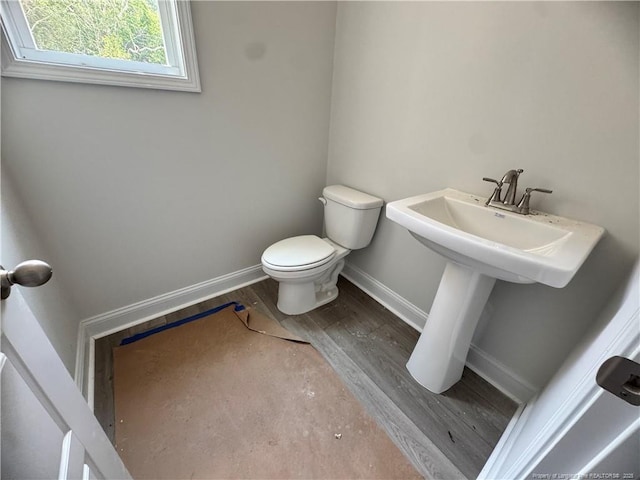 303 Hendrix B Rd, Raeford, NC 28376 - bathroom with toilet and wood finished floors