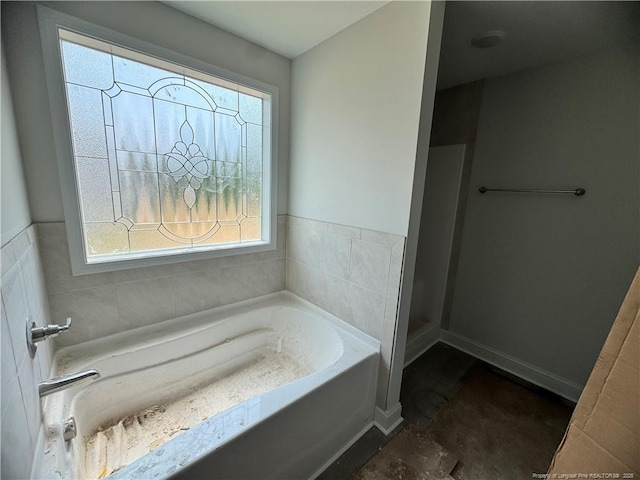 303 Hendrix B Rd, Raeford, NC 28376 - full bath featuring healthy amount of natural light and a bath
