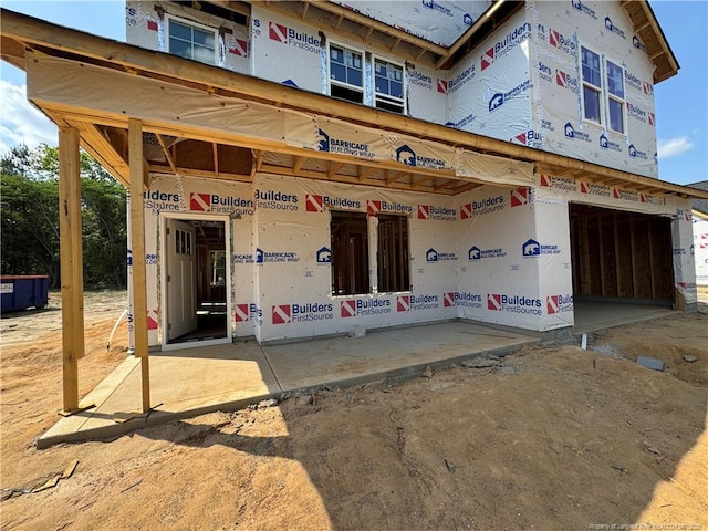 property in mid-construction featuring a garage