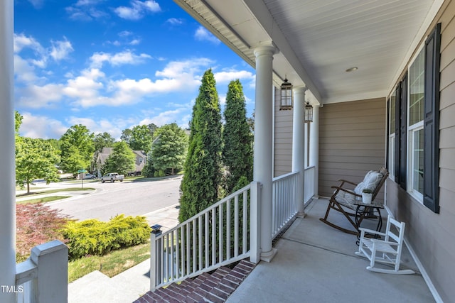 balcony featuring a porch