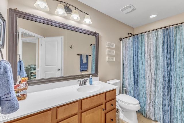 full bathroom featuring visible vents, vanity, tile patterned floors, toilet, and a shower with shower curtain