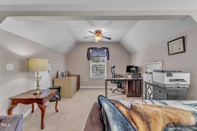 office space featuring baseboards, a ceiling fan, carpet flooring, and lofted ceiling