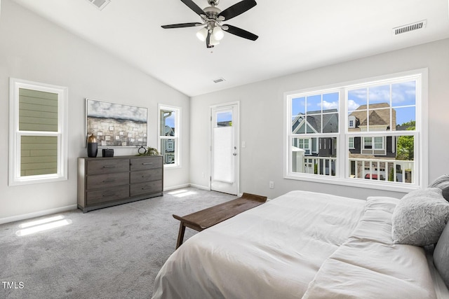 bedroom with baseboards, carpet, lofted ceiling, and visible vents