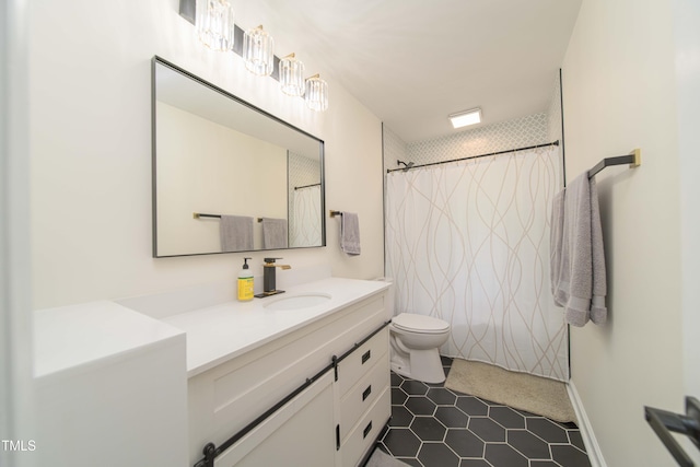 full bathroom featuring toilet, curtained shower, tile patterned flooring, and vanity