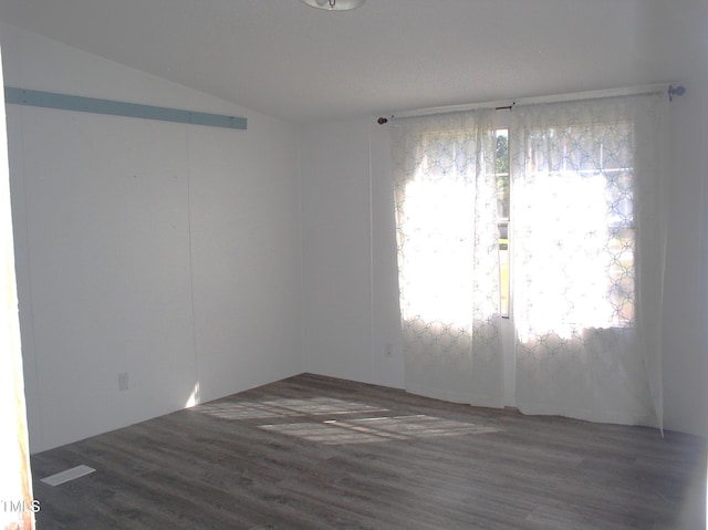 empty room featuring wood finished floors