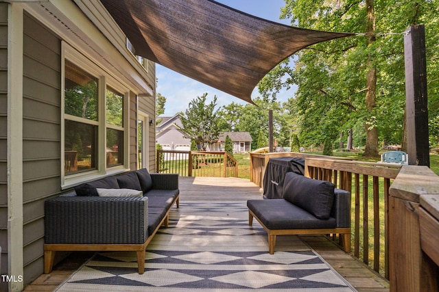 wooden deck featuring an outdoor hangout area